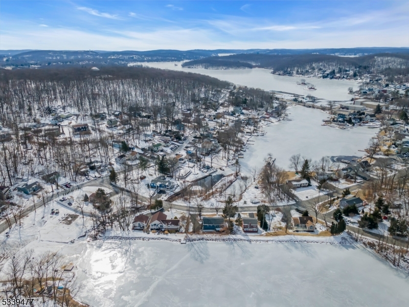 Best of both lakes! Enjoy the gentle scenic setting over Lake Winona with club house and beach. Option to purchase lakefront lot w/shed on Lk Hopatcong in Brights Cove