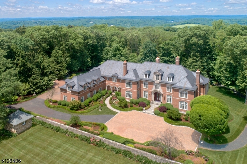 Stately and private the home's setting is peaceful.