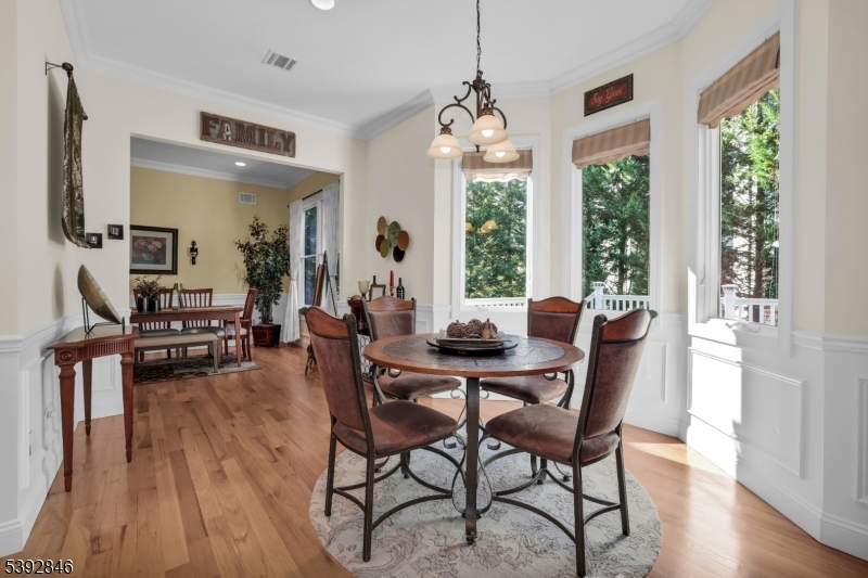 Kitchen Eating Area Wood floors, slider to Trex deck