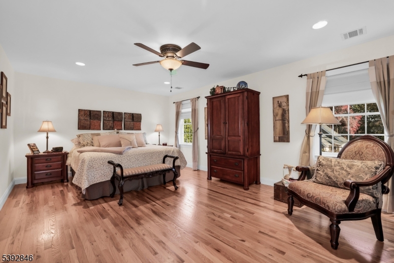 Primary Suite Wood floors, recessed lighting
