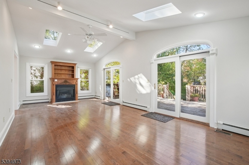 Family Room/Great Room Cathedral ceilings, hardwood floors, skylights, gas fireplace