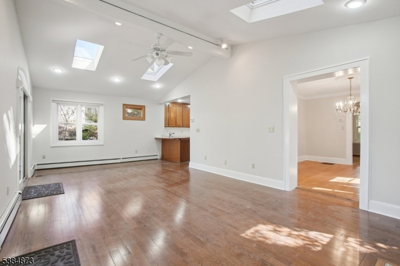 Family Room open to kitchen with informal eat in area and breakfast bar