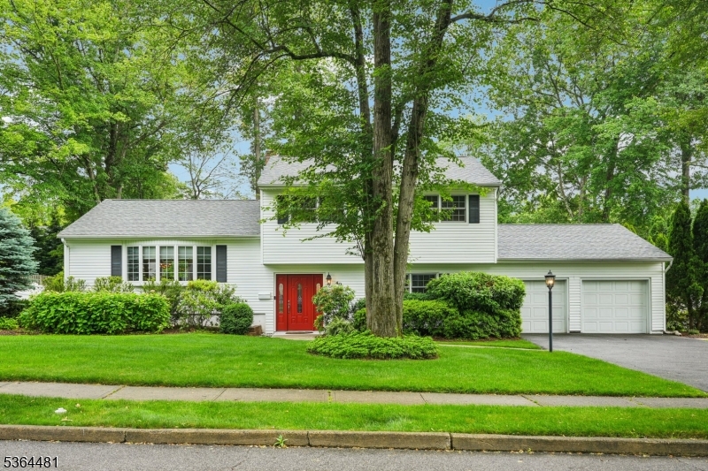 Welcome home to this beautifully maintained 3 bedroom 2.5 bathroom Split Level, perfectly situated on a manicured lot in a convenient commuter friendly location.