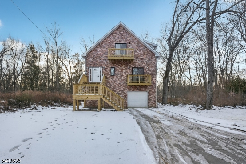 Welcome home to this newly constructed 4 bedroom 2 bathroom Colonial home nestled on a wooded lot in the heart of Wayne.