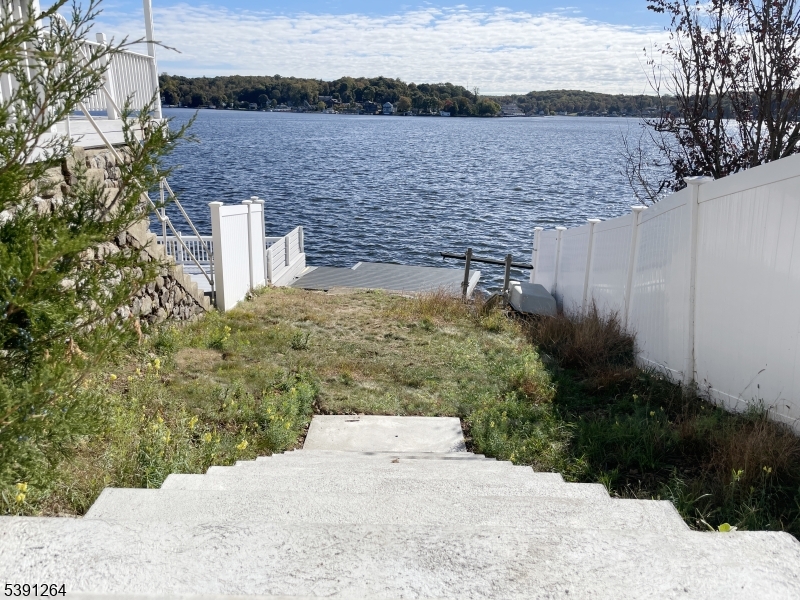 street view of lot and lake