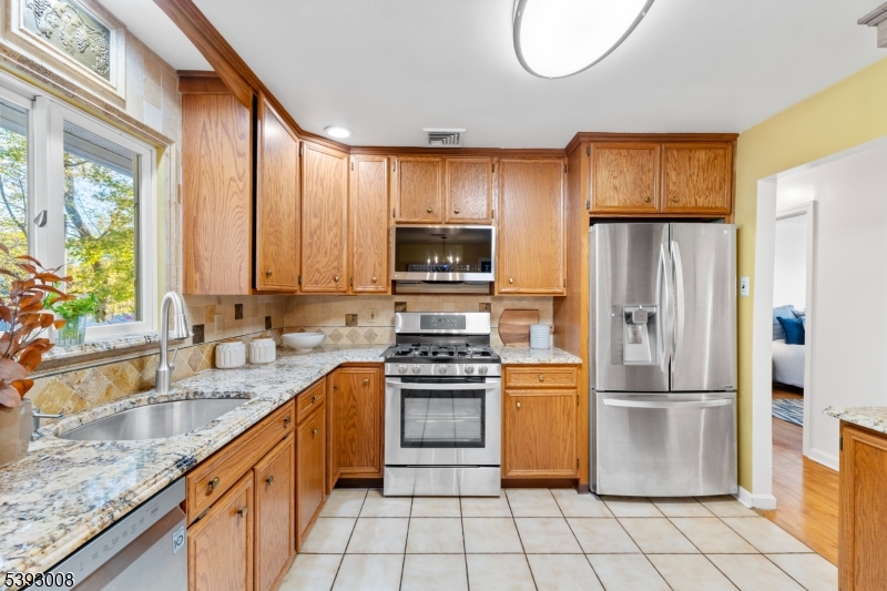 Kitchen Custom cabinertry, with pantry, pull out drawers, lazy susan etc