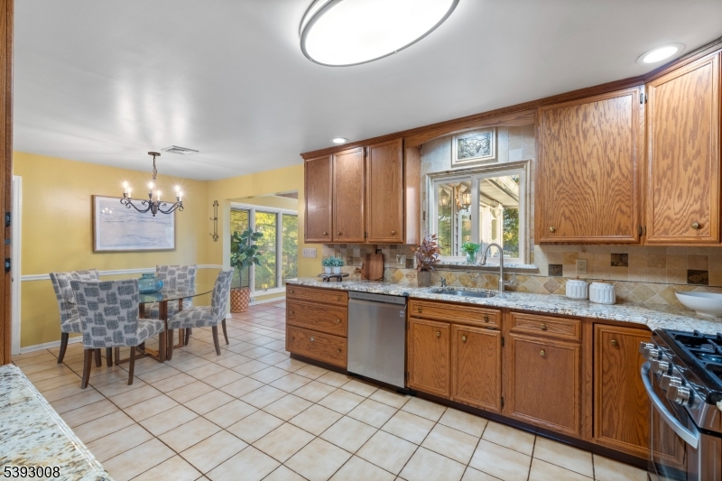 Kitchen alt view expansice counter space & stainless appliances