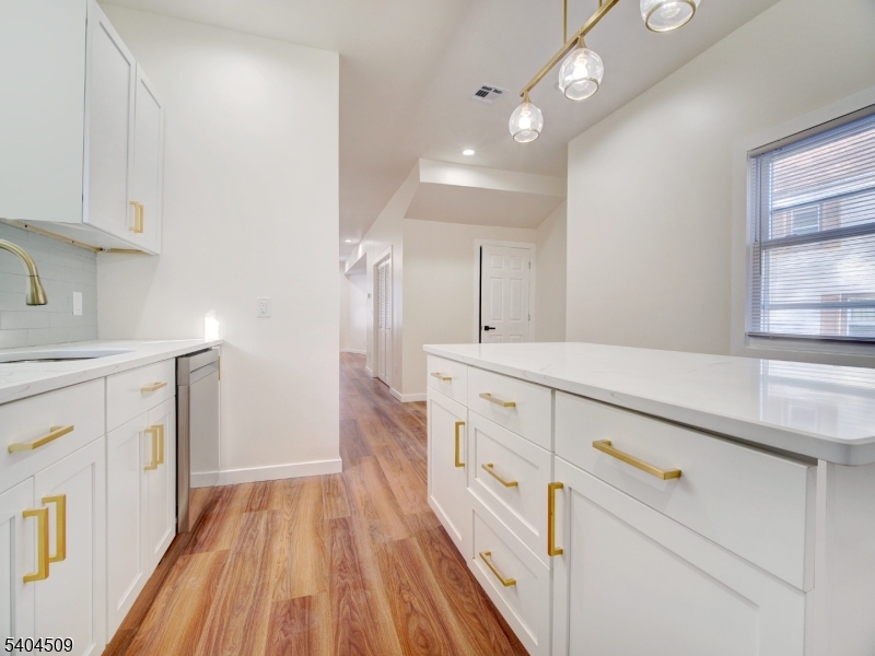 Easy Close cabinets and a pot filler for the rice or pasta