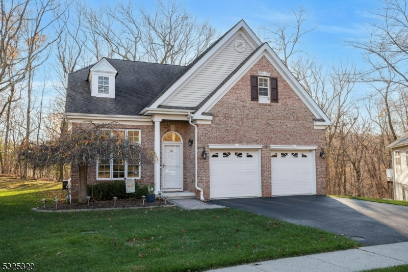 Brick-front Colonial offers fabulous curb appeal! Community amenities include lawncare, snow removal, clubhouse, pool, tennis and more, offering a wonderful relaxing lifestyle !