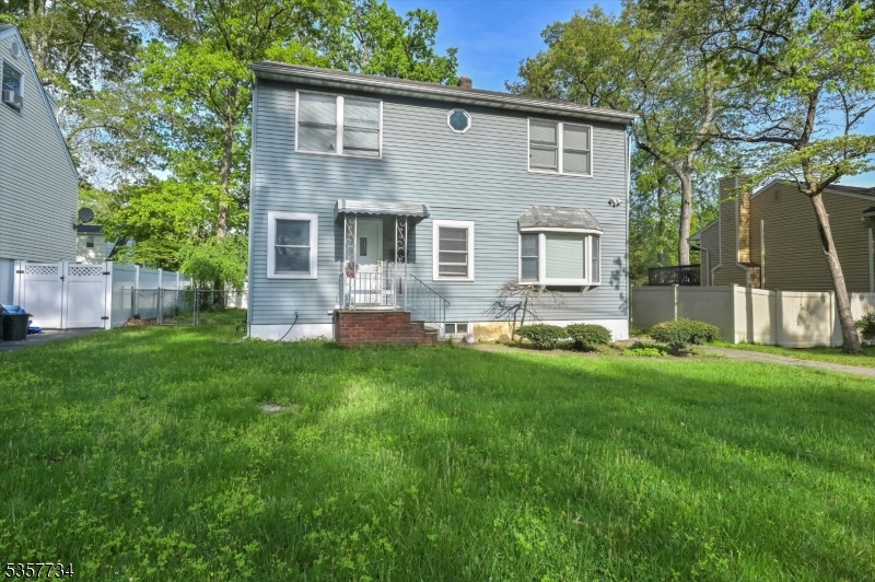 Welcome home to this beautifully maintained custom 3 bedroom 2 bathroom Colonial nestled on a level, wooded lot.