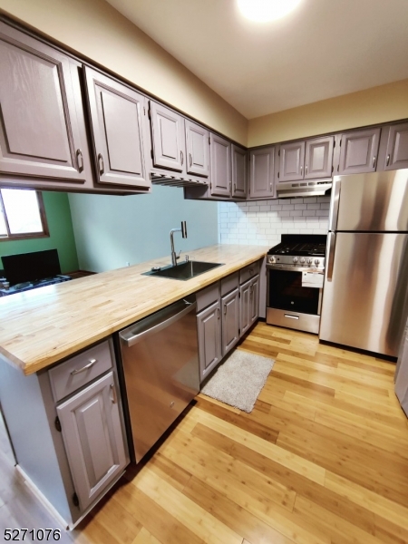 Beautifully updated kitchen with stainless steel appliances