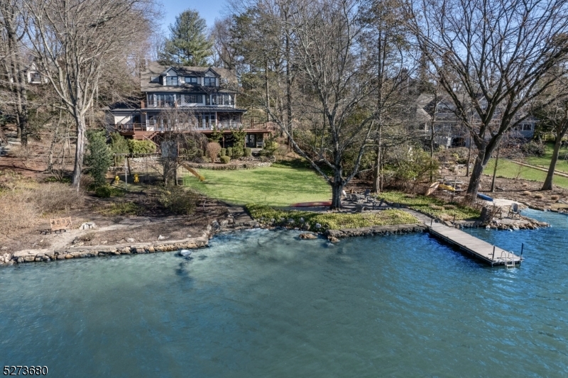Stunning home centrally located on the main lake with private dock.