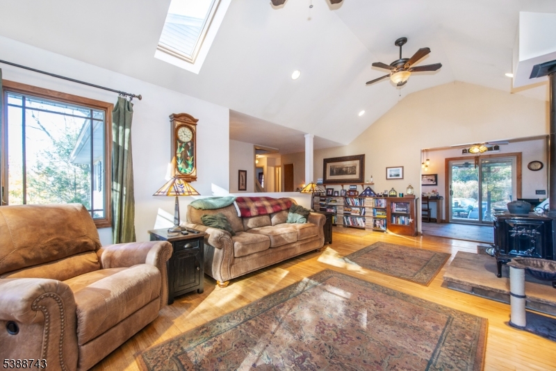 Living Room skylights,woodburning stove,hardwood