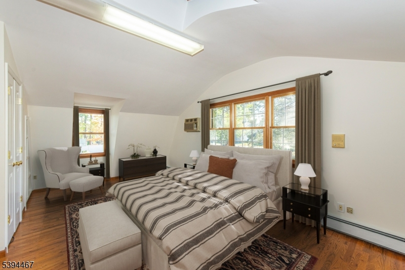 Bedroom 4 Located above the 3 car garage, virtually staged