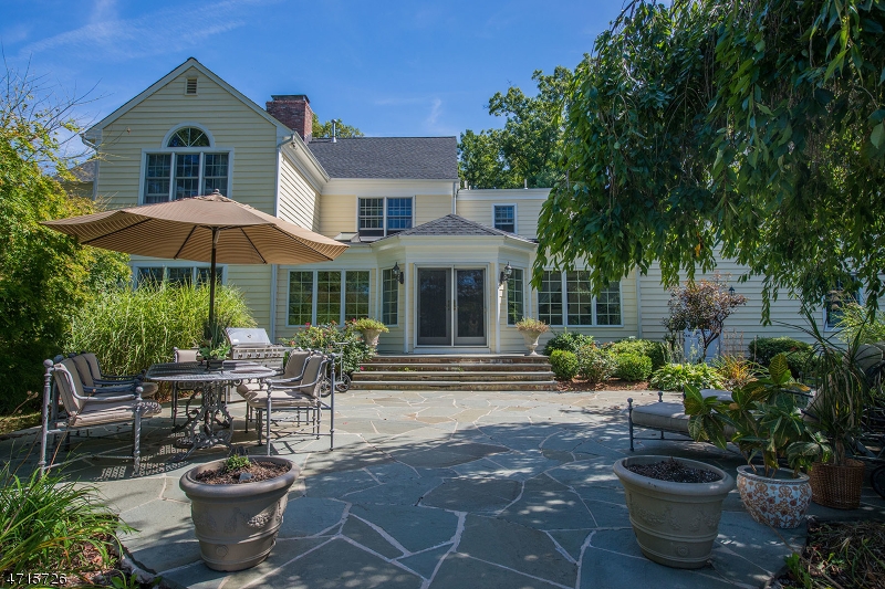 Bluestone patio. House has been painted white now.