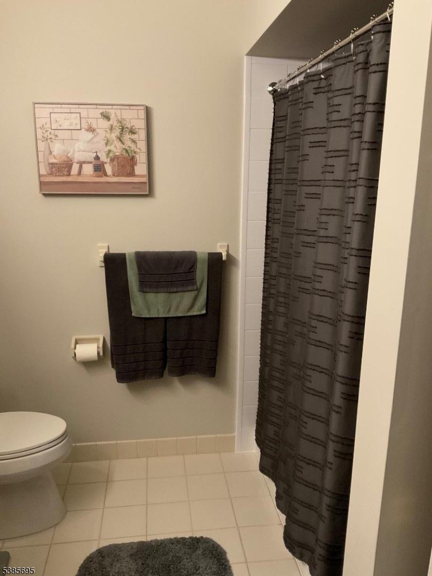 Tub sized stall shower