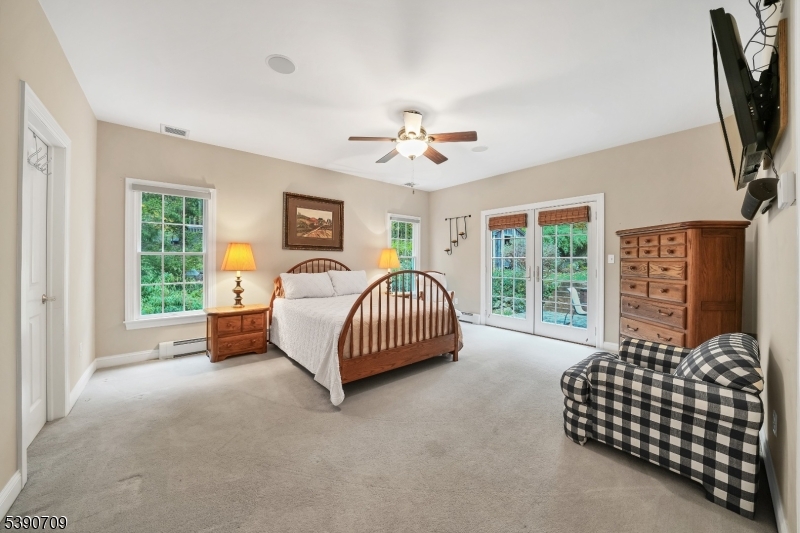 1st Floor Bedroom En Suite Full bathroom attached and french doors to private patio