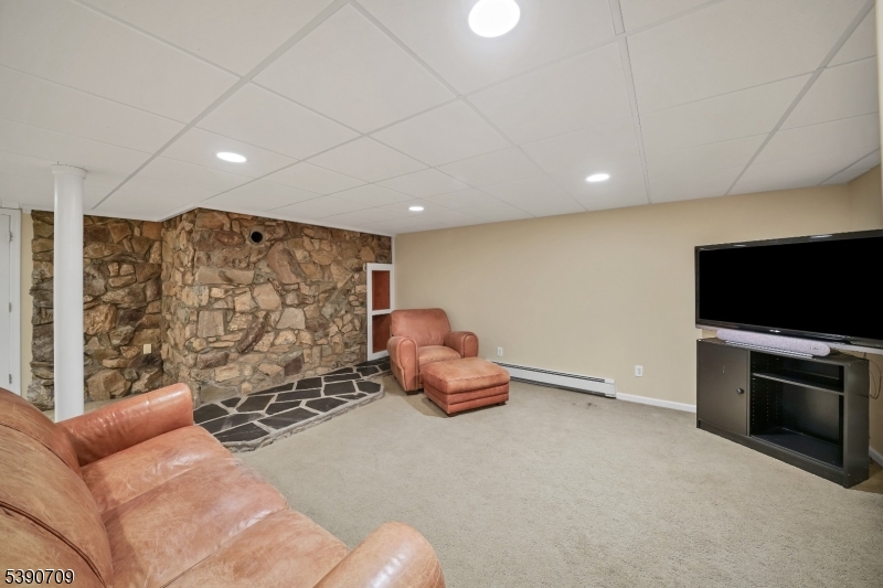 Recreation Room - Basement Built for wood-burning stove