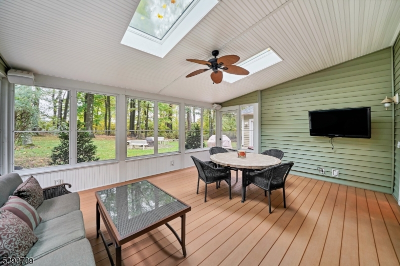 Screened-In Porch Wall of windows and skylights