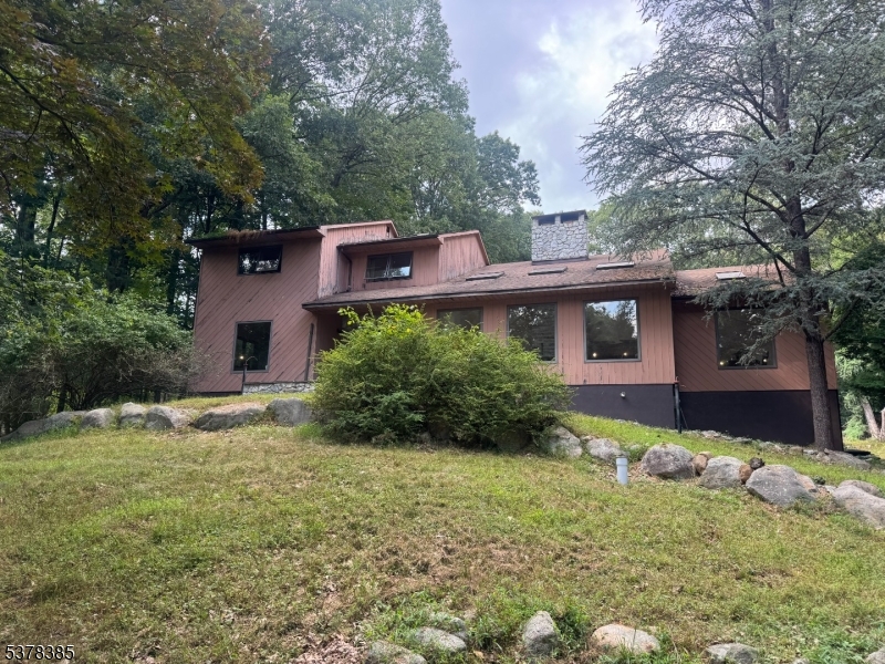 Welcome home to this expansive 8 bedroom 5.5 Contemporary, offering 5,760 sq ft of living space.