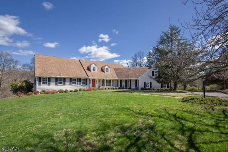 Situated on 9.5 Acres of open and wooded land.