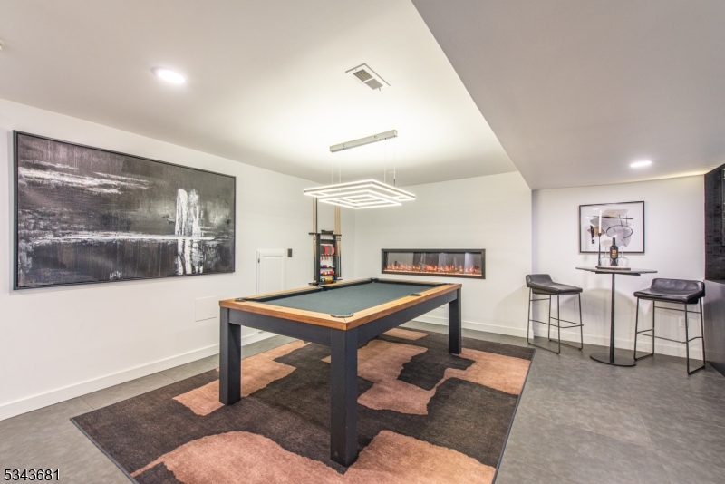 Pool area with fireplace