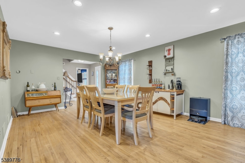 Living Room Hardwood floors, currently used as a dining room