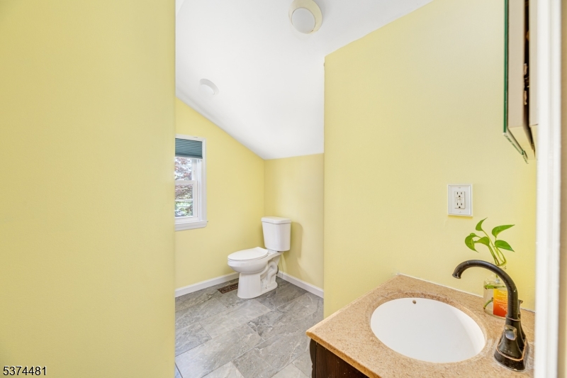 Bathroom in building 2 Full bathroom with tub and shower