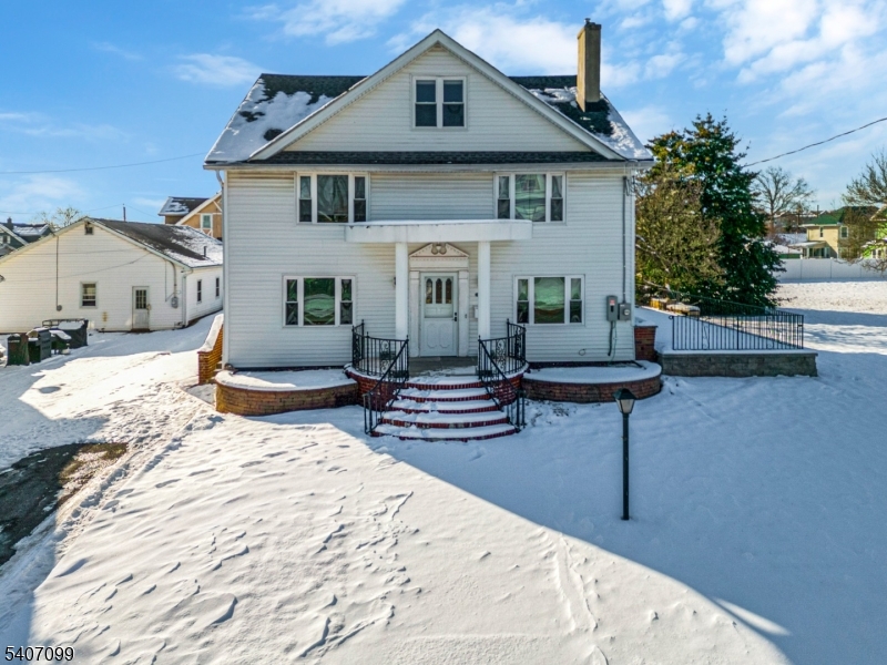FRONT VIEW Three-Level Home with Income Potential