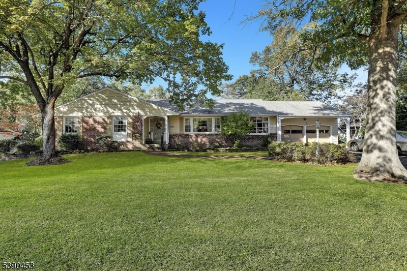 Lovely curb appeal with partial brick front & mature trees and landscaping. Situated on dead end street in location offering easy access to all.