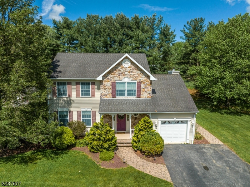 Your Heart will Know it is HOME upon arriving to this Lovely 3 BR, 2.5 Bath Col Nestled on a .74 ACRE Lot within the HIGHLY SOUGHT After & SCENIC Twp of Lopatcong! This Beautiful Home is Backed by a MATURE Tree Line offering a Natural PRIVACY BARRIER!