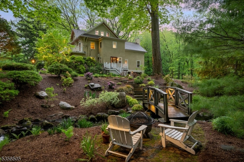 Beautiful gardens and stream on property