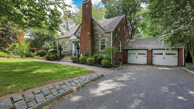 right side drive way w/ 2 car garage