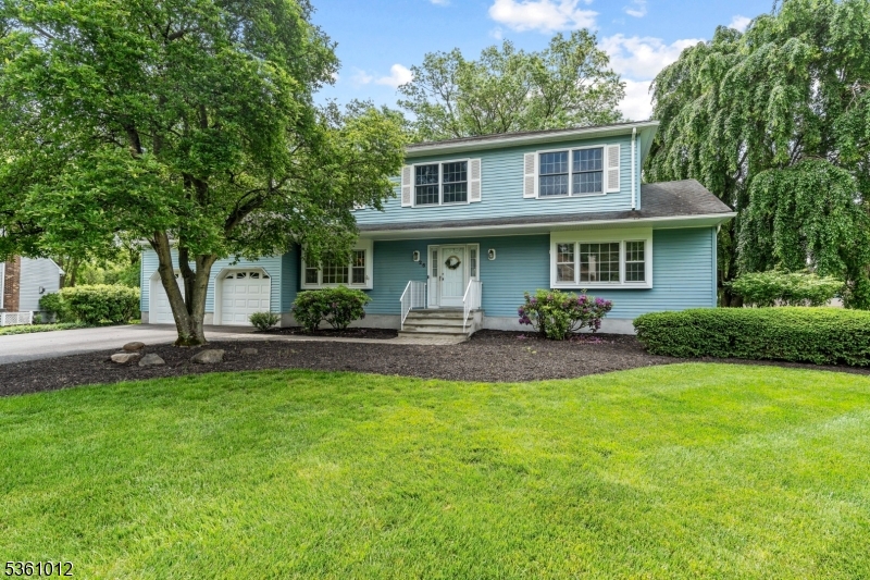 Landscaped Front Yard; Vinyl Siding