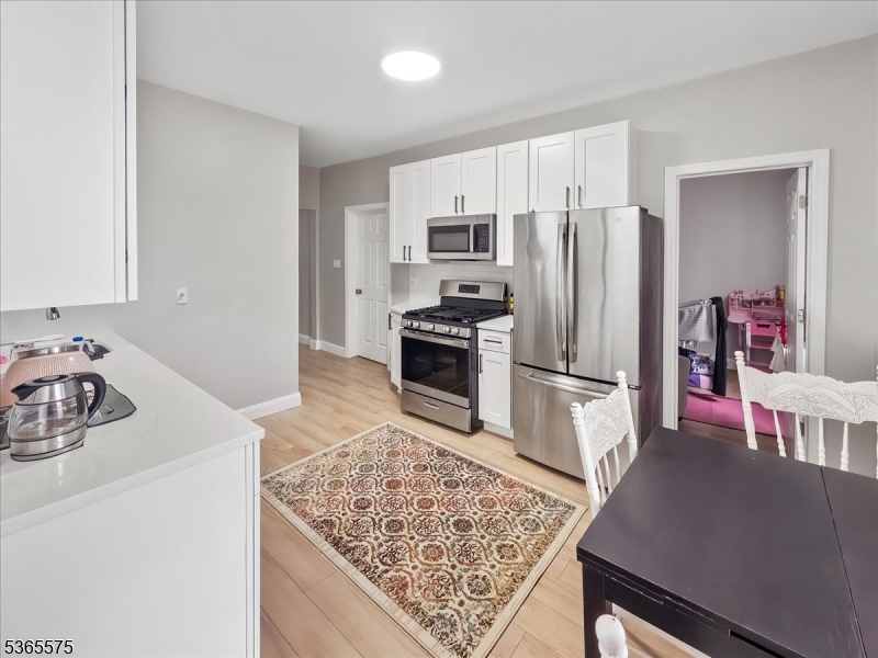 Recently renovated with new appliances, floors and cabinets