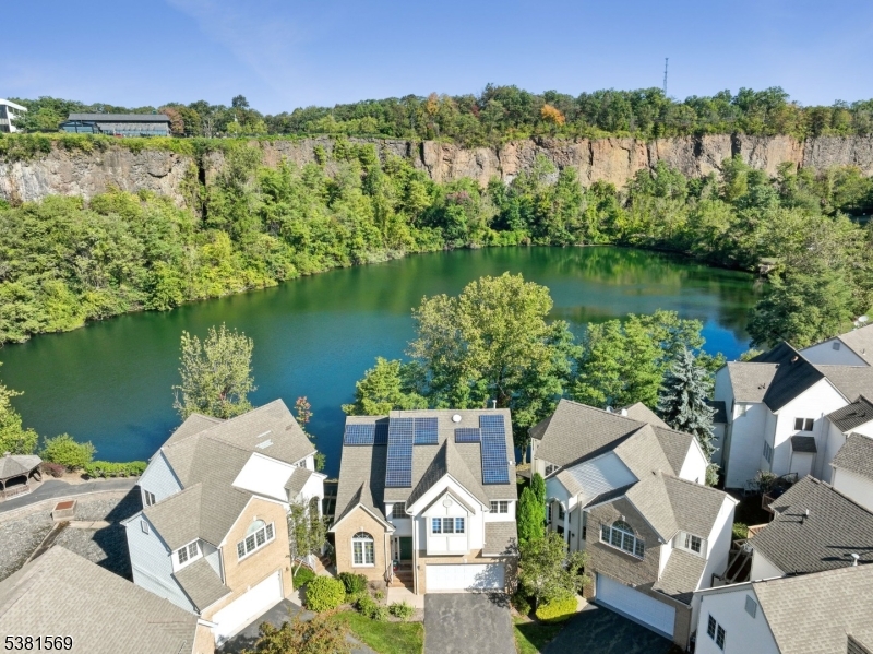 Aerial View of house and lake