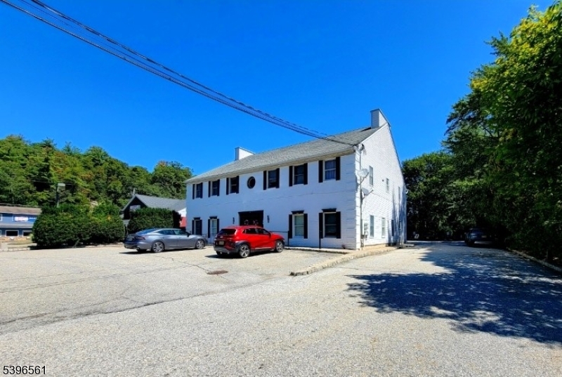 Spacious 2nd  floor unit in professional building with private tenant entrance.