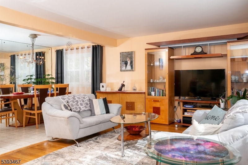 LIVING SPACE! WOOD FLOORS THROUGHOUT - TILE IN KITCHEN AND BATH
