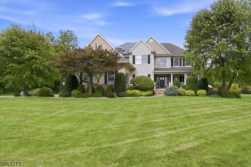 Pristine Home on 4.9 acres This beautiful property is the ultimate retreat!! In-ground pool, fire pit, outdoor kitchen and volleyball court!!