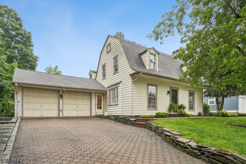 2 car oversized garage, paver driveway
