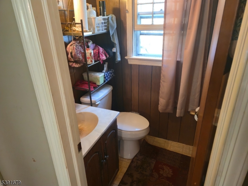 Powder Room First Floor,  Directly Across from Family Rm / Den / 5th BR