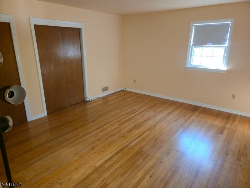 Primary Bedroom Alt View Hardwood Floors 2 Double Closets