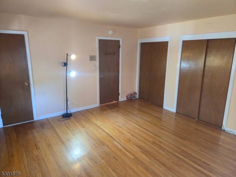 Primary BR Alt View Hardwood Floors