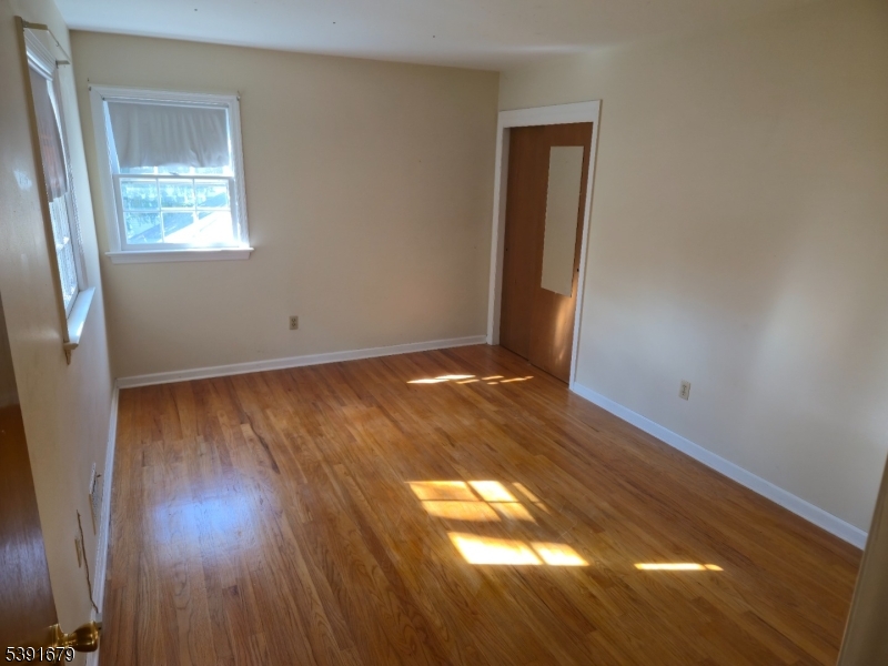 Fourth Bedroom Hardwood Floors