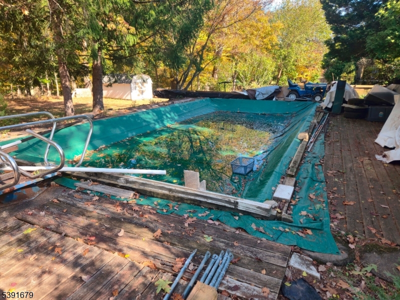 In Ground Pool Cement w/ Liner. Pool hasn't been opened in many years. No Filtration System. Needs Complete Rehab.