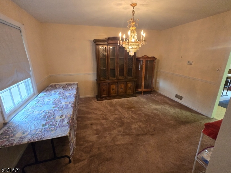 Dining Room Hardwood Floors under Carpet!