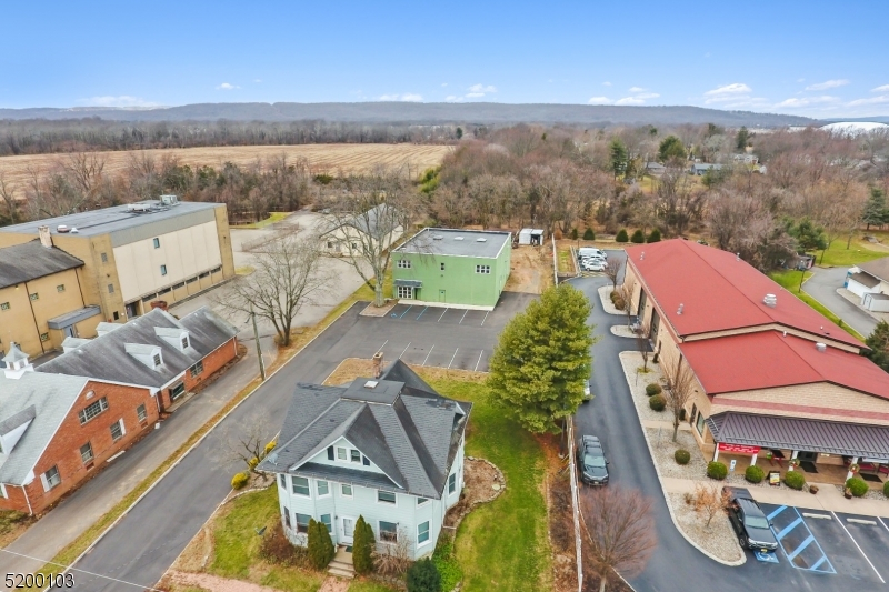 View above Route 206 from front to rear. Single-Family Residence fronts route 206. Commercial building toward the rear of the property.