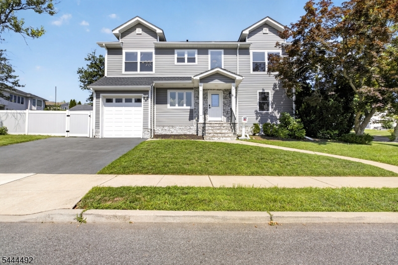 Front Corner lot with view of widened driveway