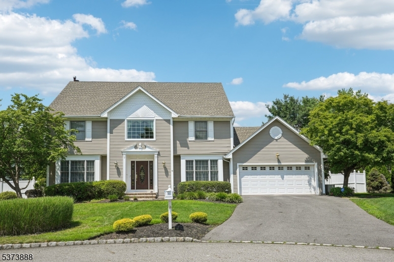 Welcome home to this beautifully maintained 4 bedroom 2.2 bathroom Colonial nestled on a manicured lot in a quiet, sought after neighborhood.