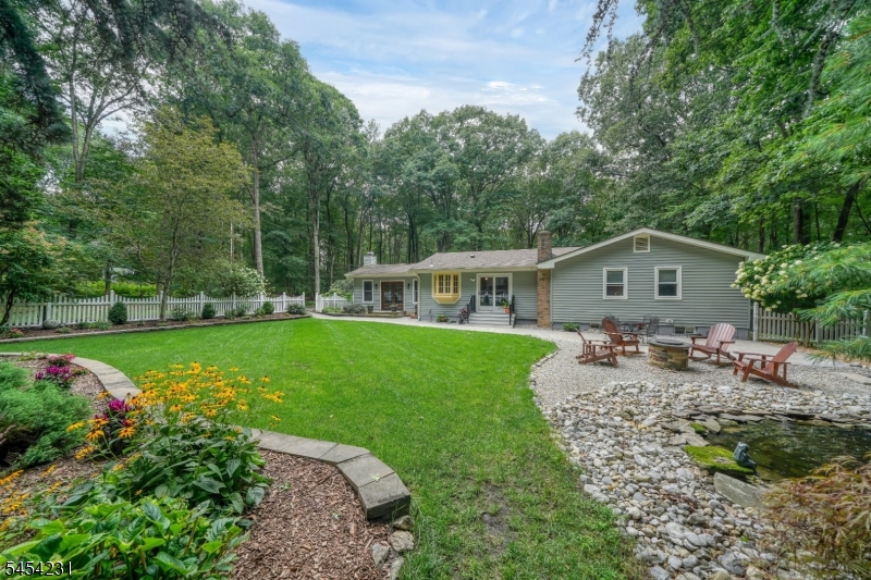 Welcome! Privacy abounds!! This 3 bedroom, 3 bathroom ranch is located on 2.9 acres.